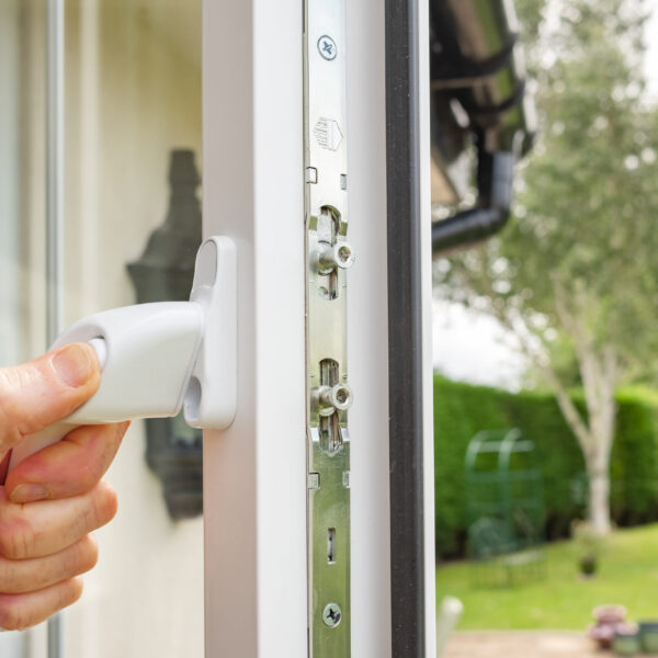 Person seen opening in a newly installed double glazed window on Person seen opening in a newly installed double glazed window on